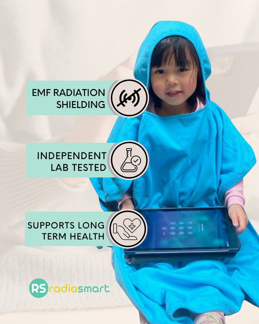 Stay cozy and protected with the Radia Smart® Children’s Hooded Poncho Blanket (Blue), featuring silver-lined Faraday fabric for EMF, RF, and 5G radiation shielding. Made with soft, breathable materials, it offers comfort and safety for growing kids by reducing exposure to harmful wireless signals. Perfect for home, travel, or rest time, this poncho supports wellness while keeping little ones warm and shielded in a stylish, kid-friendly design.