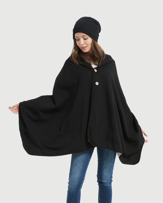 Embrace wellness with the Radia Smart® BUNDLE DEAL EMF Protection Poncho and Slouch Beanie in Black. Lined with silver Faraday fabric, this set blocks EMF, RF, and 5G radiation to support fertility and overall health. Made from soft, breathable materials, the poncho and beanie offer stylish comfort and effective shielding. Ideal for daily wear, this bundle helps reduce wireless exposure while keeping you cozy, protected, and fashion-forward.