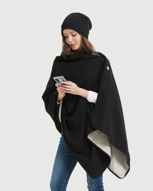 Embrace wellness with the Radia Smart® BUNDLE DEAL EMF Protection Poncho and Slouch Beanie in Black. Lined with silver Faraday fabric, this set blocks EMF, RF, and 5G radiation to support fertility and overall health. Made from soft, breathable materials, the poncho and beanie offer stylish comfort and effective shielding. Ideal for daily wear, this bundle helps reduce wireless exposure while keeping you cozy, protected, and fashion-forward.