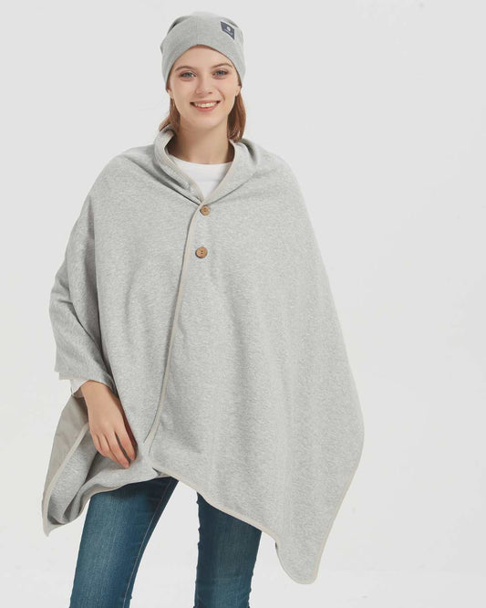 Embrace wellness with the Radia Smart® BUNDLE DEAL EMF Protection Poncho and Slouch Beanie in Grey. Silver-lined with Faraday fabric, this set blocks EMF, RF, and 5G radiation, supporting fertility and overall health. Made from soft, breathable materials, the poncho and beanie offer stylish comfort and powerful shielding. Perfect for daily wear, this bundle provides peace of mind and protection from modern wireless exposure.