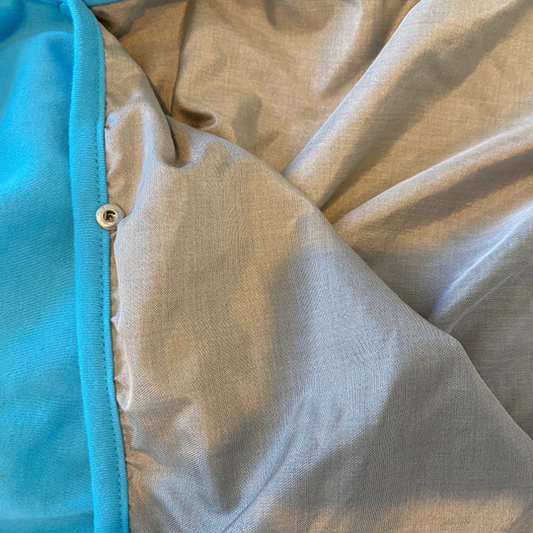 Stay cozy and protected with the Radia Smart® Children’s Hooded Poncho Blanket (Blue), featuring silver-lined Faraday fabric for EMF, RF, and 5G radiation shielding. Made with soft, breathable materials, it offers comfort and safety for growing kids by reducing exposure to harmful wireless signals. Perfect for home, travel, or rest time, this poncho supports wellness while keeping little ones warm and shielded in a stylish, kid-friendly design.