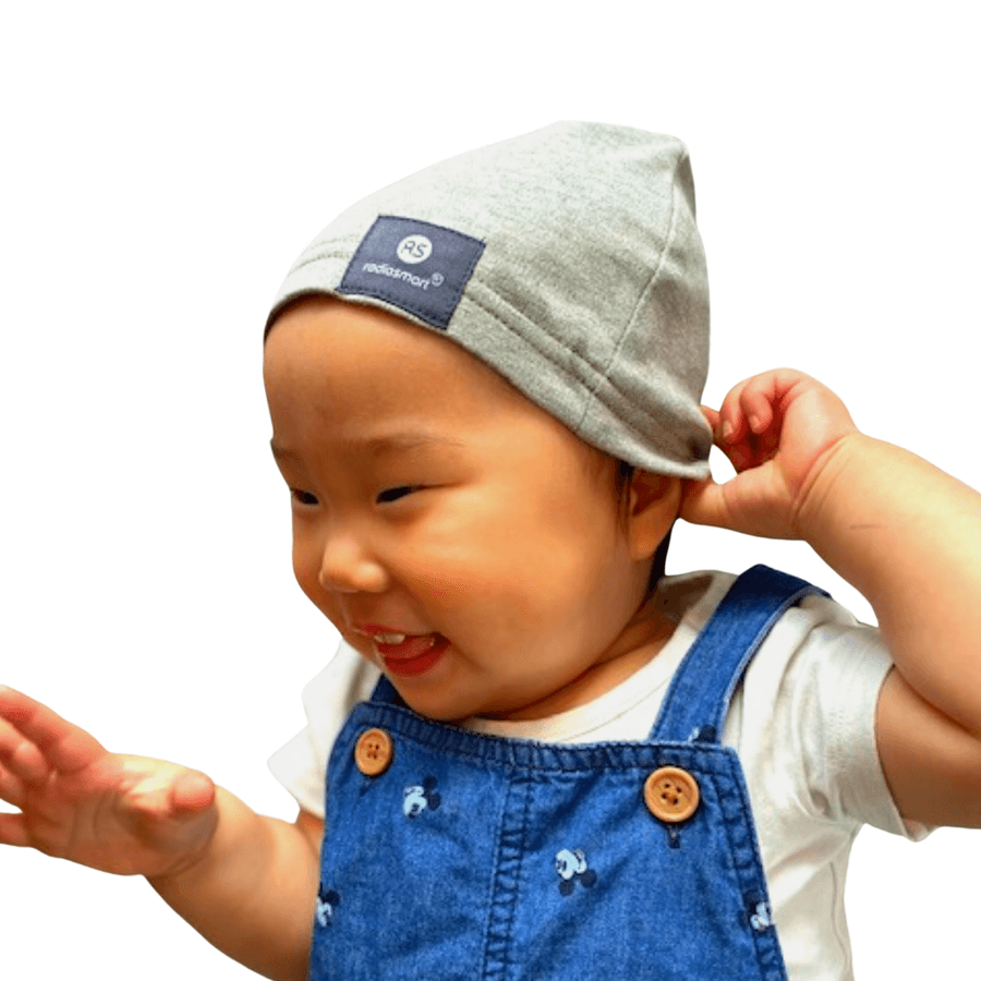 Protect your little one with the Radia Smart® Baby Hat Beanie, designed for ages 0–4 with three size options: Newborn, Baby, and Toddler. Made with silver-lined Faraday fabric, it offers EMF and RF blocking to reduce exposure to wireless radiation. Soft, breathable, and gentle on delicate skin, this beanie supports wellness and comfort for growing children. Ideal for everyday wear, it provides peace of mind with stylish, effective protection.
