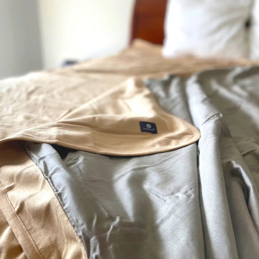 Stay cozy and protected with the Radia Smart® Classic Mega/XL Size Bed Blanket. Made from 100% cotton and silver-lined Faraday fabric, it blocks EMF, RF, and 5G radiation for a safer sleep environment. This breathable, soft bed blanket doubles as a bed sheet, offering full-body coverage and comfort while reducing wireless exposure. Ideal for promoting restful sleep and overall wellness in today’s connected world.
