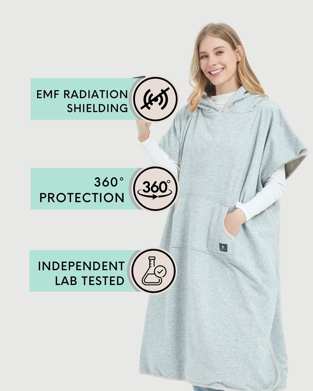 Radia Smart® Adult Hooded Poncho Blanket in Grey offers stylish, full-body comfort with built-in wellness protection. Silver-lined fabric provides advanced shielding against EMF, RF, and 5G radiation, acting as a wearable Faraday cage. Ideal for home, travel, or outdoor use, this hooded poncho combines cozy design with smart technology to help reduce exposure to harmful wireless signals. One-size-fits-most for adults.