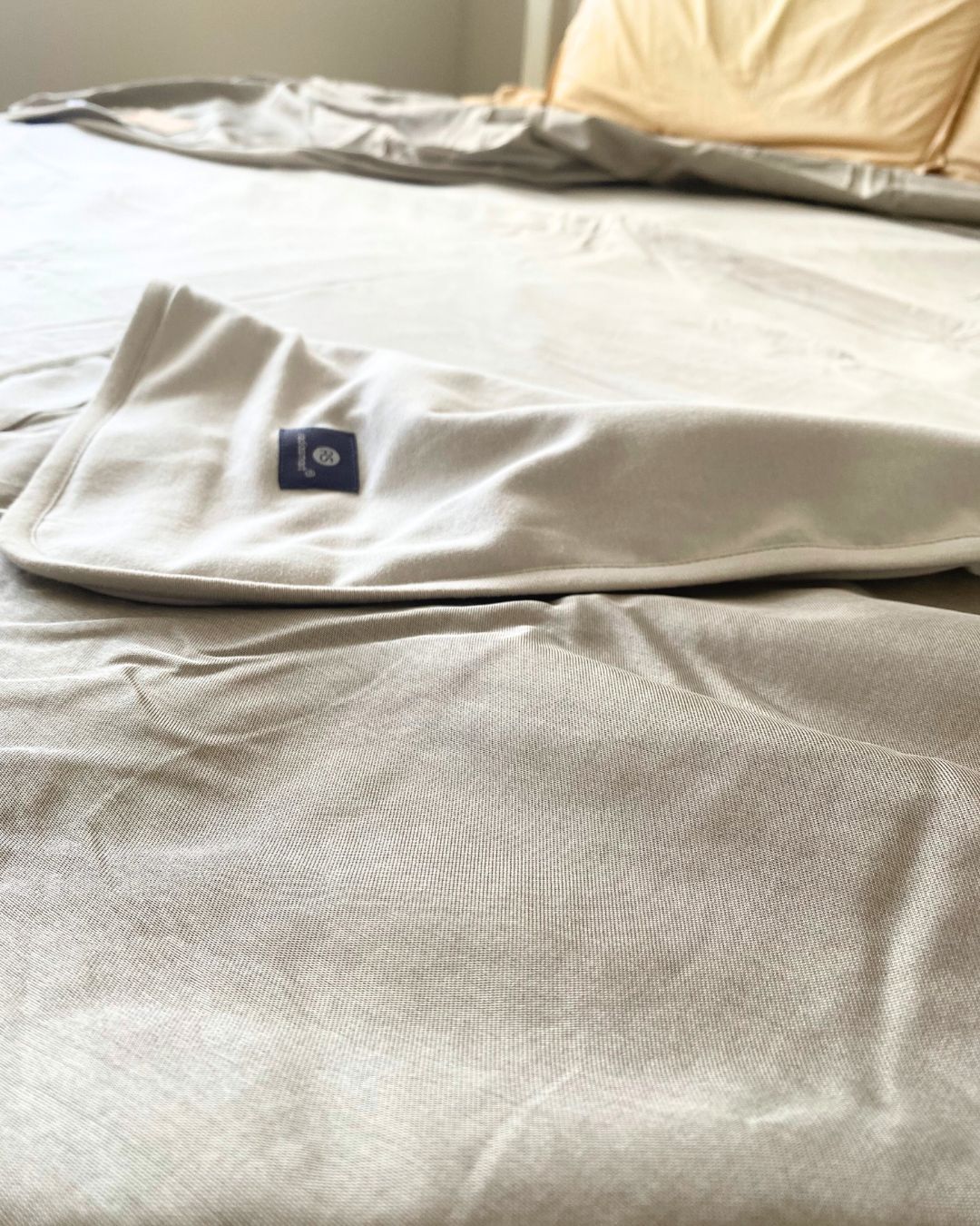 Stay cozy and protected with the Radia Smart® Mega Large EMF Protection Bed Blanket in Grey. Made from 100% cotton and silver-lined Faraday fabric, it blocks EMF, RF, and 5G radiation for a safer sleep environment. This breathable, soft bed blanket doubles as a bed sheet, offering full-body coverage and comfort while reducing wireless exposure. Ideal for promoting restful sleep and overall wellness in today’s connected world.