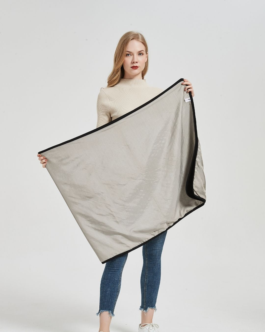 Embrace wellness with the Radia Smart® BUNDLE DEAL EMF Protection Poncho and Slouch Beanie in Black. Lined with silver Faraday fabric, this set blocks EMF, RF, and 5G radiation to support fertility and overall health. Made from soft, breathable materials, the poncho and beanie offer stylish comfort and effective shielding. Ideal for daily wear, this bundle helps reduce wireless exposure while keeping you cozy, protected, and fashion-forward.