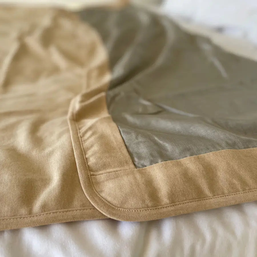 Stay cozy and protected with the Radia Smart® Classic XL Organic Cotton Bed Blanket. Crafted with silver-lined Faraday fabric, it provides powerful EMF protection by shielding against RF and 5G radiation. This extra-large, breathable, and soft blanket supports restful sleep and overall wellness. Ideal for daily use, it offers full-body coverage and reduces exposure to wireless signals in a natural, organic, and comfortable design.