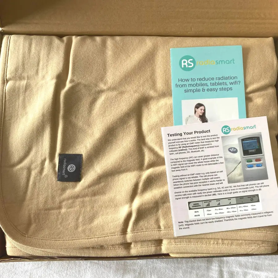 Stay cozy and protected with the Radia Smart® Classic XL Organic Cotton Bed Blanket. Crafted with silver-lined Faraday fabric, it provides powerful EMF protection by shielding against RF and 5G radiation. This extra-large, breathable, and soft blanket supports restful sleep and overall wellness. Ideal for daily use, it offers full-body coverage and reduces exposure to wireless signals in a natural, organic, and comfortable design.