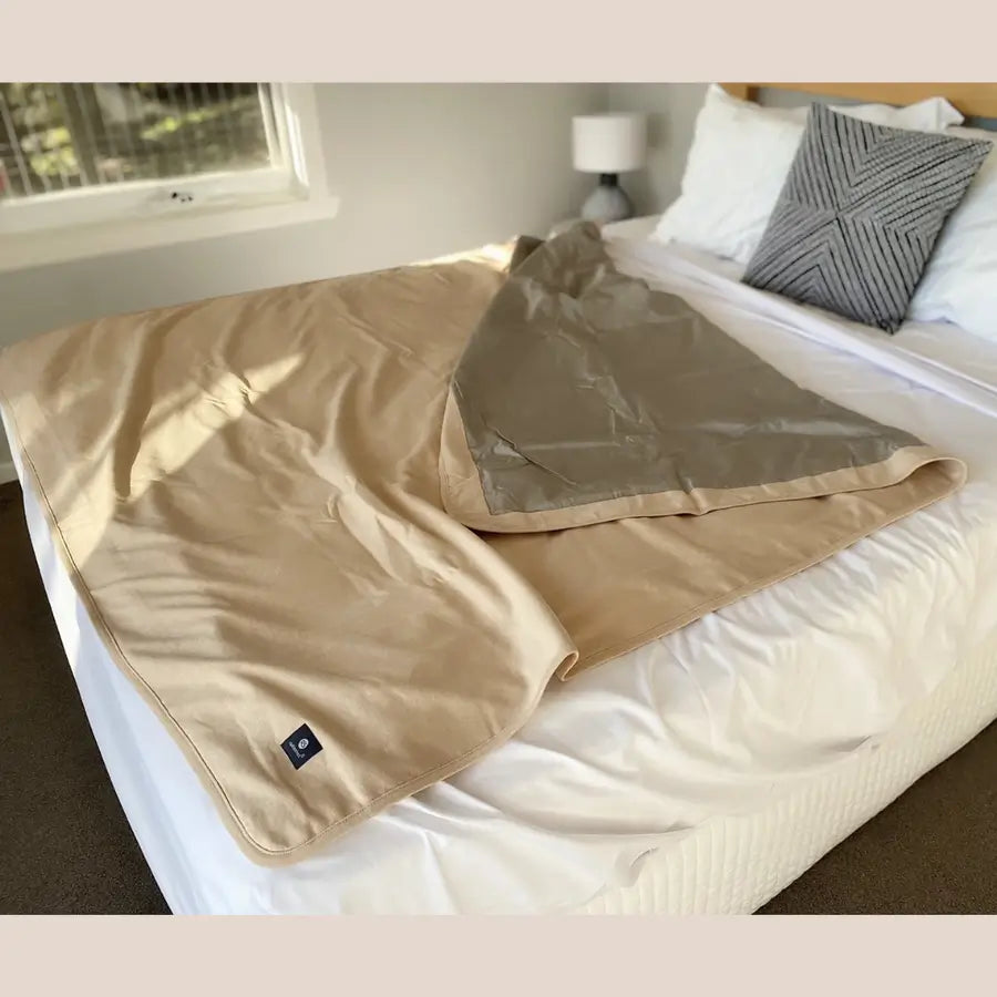 Stay cozy and protected with the Radia Smart® Classic XL Organic Cotton Bed Blanket. Crafted with silver-lined Faraday fabric, it provides powerful EMF protection by shielding against RF and 5G radiation. This extra-large, breathable, and soft blanket supports restful sleep and overall wellness. Ideal for daily use, it offers full-body coverage and reduces exposure to wireless signals in a natural, organic, and comfortable design.
