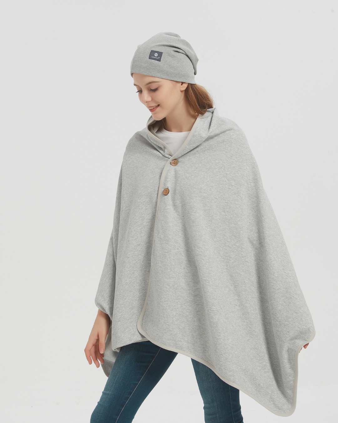 Embrace wellness with the Radia Smart® BUNDLE DEAL EMF Protection Poncho and Slouch Beanie in Grey. Silver-lined with Faraday fabric, this set blocks EMF, RF, and 5G radiation, supporting fertility and overall health. Made from soft, breathable materials, the poncho and beanie offer stylish comfort and powerful shielding. Perfect for daily wear, this bundle provides peace of mind and protection from modern wireless exposure.