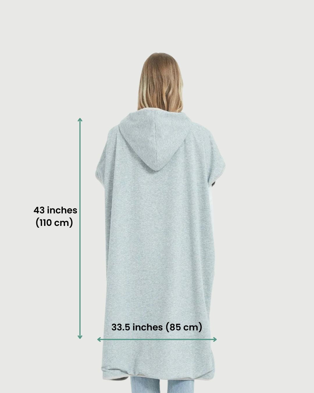 Radia Smart® Adult Hooded Poncho Blanket in Grey offers stylish, full-body comfort with built-in wellness protection. Silver-lined fabric provides advanced shielding against EMF, RF, and 5G radiation, acting as a wearable Faraday cage. Ideal for home, travel, or outdoor use, this hooded poncho combines cozy design with smart technology to help reduce exposure to harmful wireless signals. One-size-fits-most for adults.