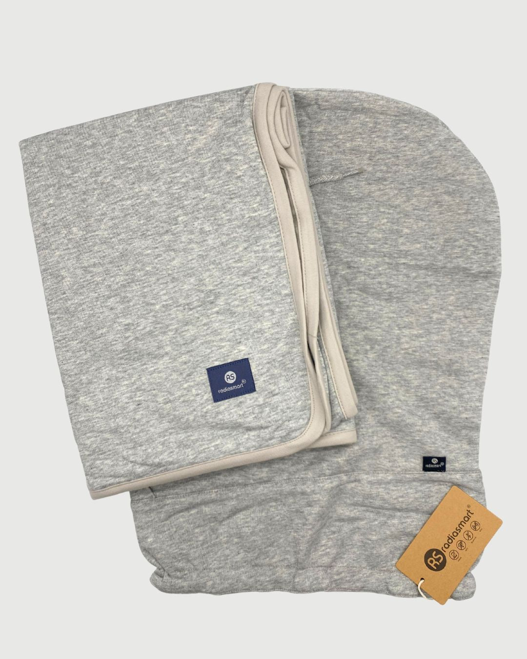 Stay cozy and protected with the Radia Smart® BUNDLE DEAL EMF Protection Poncho and Hood in Grey. Silver-lined with Faraday shielding, this set blocks EMF, RF, and 5G radiation to support fertility and overall wellness. Made with soft, breathable fabric, it offers comfort and stylish coverage for daily wear. Ideal for those seeking added protection from wireless exposure while maintaining warmth and peace of mind. A smart, health-conscious choice for modern living.