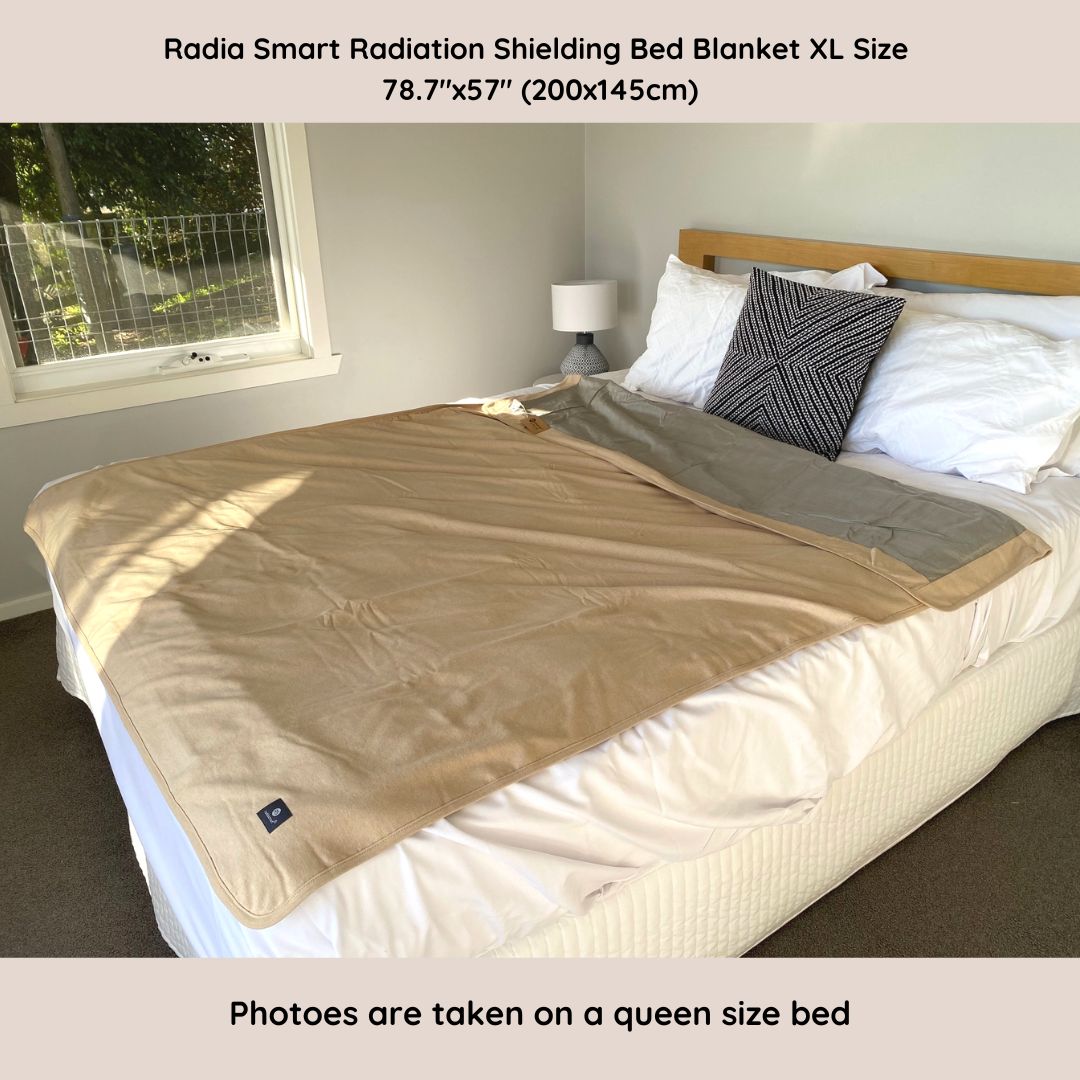 Stay cozy and protected with the Radia Smart® Classic XL Organic Cotton Bed Blanket. Crafted with silver-lined Faraday fabric, it provides powerful EMF protection by shielding against RF and 5G radiation. This extra-large, breathable, and soft blanket supports restful sleep and overall wellness. Ideal for daily use, it offers full-body coverage and reduces exposure to wireless signals in a natural, organic, and comfortable design.