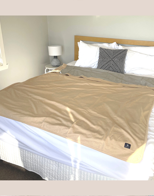 Stay cozy and protected with the Radia Smart® Classic XL Organic Cotton Bed Blanket. Crafted with silver-lined Faraday fabric, it provides powerful EMF protection by shielding against RF and 5G radiation. This extra-large, breathable, and soft blanket supports restful sleep and overall wellness. Ideal for daily use, it offers full-body coverage and reduces exposure to wireless signals in a natural, organic, and comfortable design.